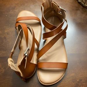 Brown sandals with zipper in the back